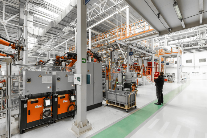 photo-automobile-production-line-welding-car-body-modern-car-assembly-plant-auto-industry-interior-hightech-factory-modern-production-1.jpg